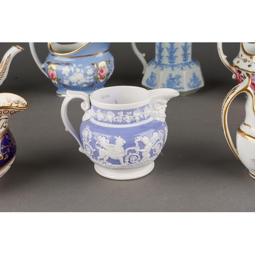214 - A collection of 19th Century cream jugs to include: 
1. Coalport with central cobalt blue and gilt, ... 