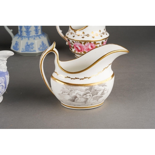 214 - A collection of 19th Century cream jugs to include: 
1. Coalport with central cobalt blue and gilt, ... 