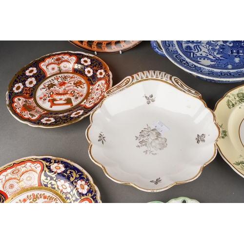 223 - A collection of 19th Century plates to include: 
Early Spode hot water plate printed with Willow pat... 