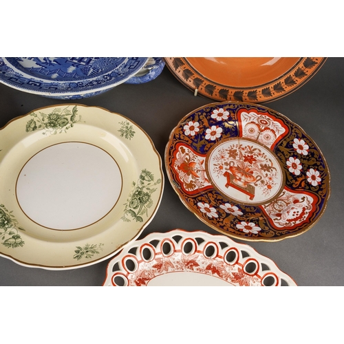223 - A collection of 19th Century plates to include: 
Early Spode hot water plate printed with Willow pat... 
