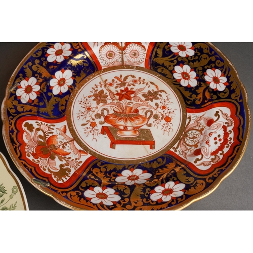 223 - A collection of 19th Century plates to include: 
Early Spode hot water plate printed with Willow pat... 