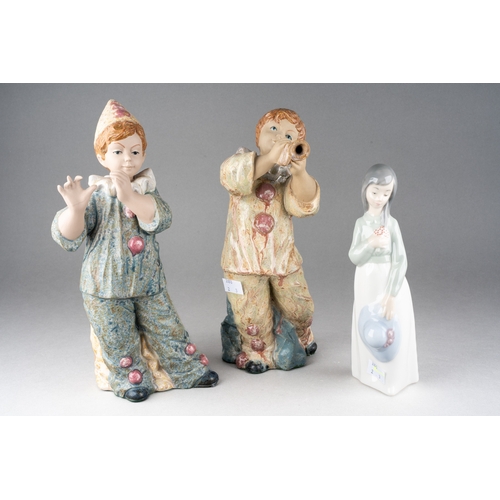 233 - A pair of Spanish figures of Pierrot style boy musicians by Porcelana Artistica Levantina, approx 31... 