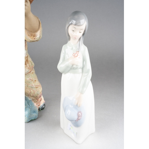 233 - A pair of Spanish figures of Pierrot style boy musicians by Porcelana Artistica Levantina, approx 31... 