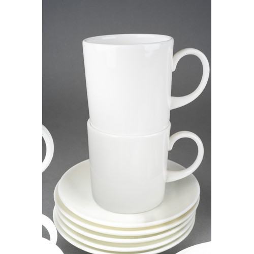 235 - A Modern unmarked Blanc-de-Chine china coffee set to include urn shaped coffee pot, six coffee cans,... 