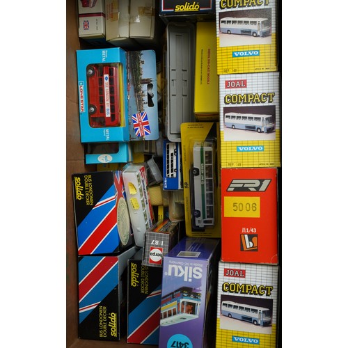 646 - A large collection of assorted model makers of cars, coaches, buses etc to include Solido, Siku, Joa... 