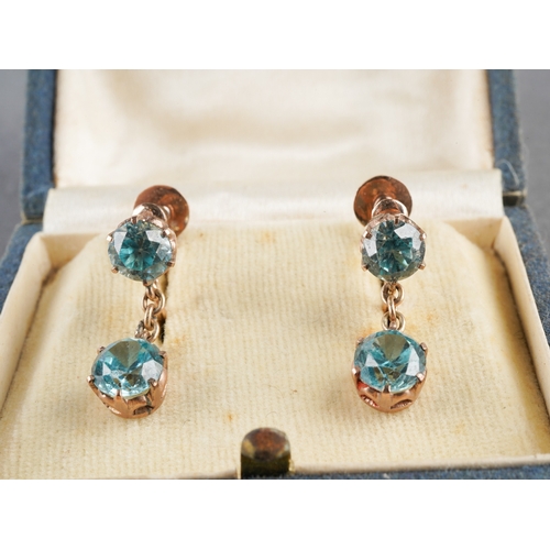 949 - A pair of mid 20th century yellow metal blue zircon earrings. Earrings approx length 18mm, approx gr... 