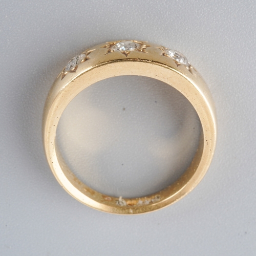 950 - An 18ct gold diamond three stone ring. Set with old cut diamonds, hallmarked 18ct gold, approx ring ... 