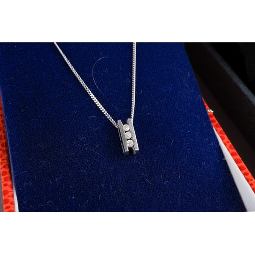 951 - Two 9ct gold and white metal diamond set pendants with chains. One pendant hallmarked 9ct gold, one ... 