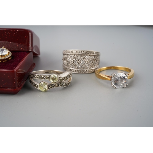A collection of silver and white metal diamond and cubic zirconia ...