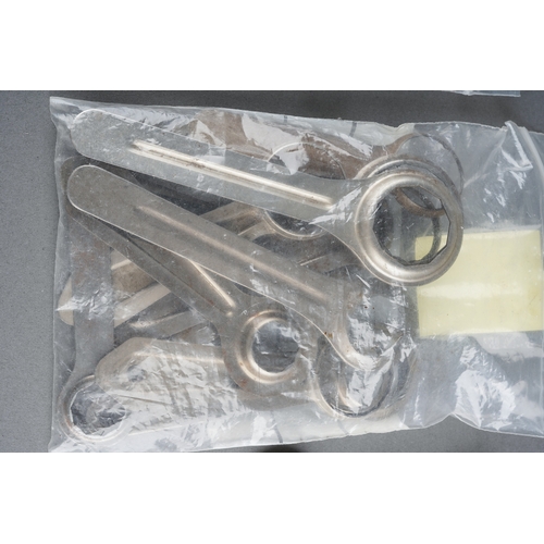 1288 - A collection of vintage watch case openers (various sizes) together with Enicar and Bradux tools and... 