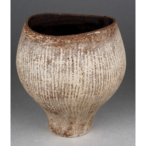 Hans Coper (1920-1981) a small stoneware cup with vertical sgraffito decoration, dark brown glazed interior, impressed HC mark within a circle, circa 1950's, approx height 11cm (1)
