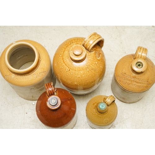 3 - Five Stoneware storage vessels / flagons including three unbranded, the larger vessel stamped Port-D... 
