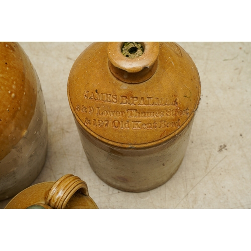 3 - Five Stoneware storage vessels / flagons including three unbranded, the larger vessel stamped Port-D... 