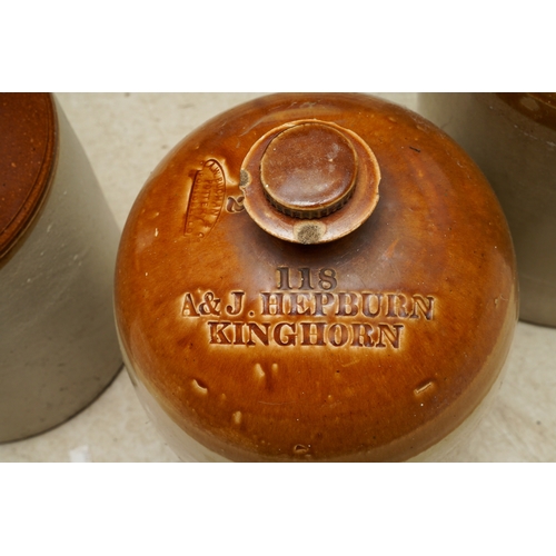 6 - Three Stoneware large storage vessels / flagons, one unbranded 48cm high, a Buchan Pottery Portobell... 