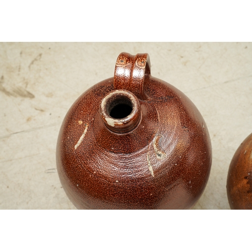 7 - Three various 18th Century Stoneware flagons, each turnover loop handle with impressed thumb mark te... 