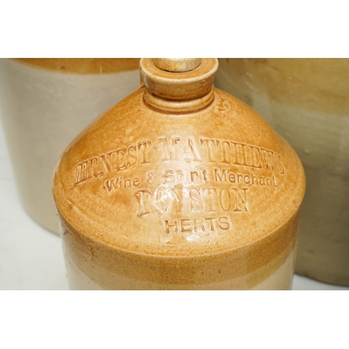 9 - Four large Stoneware storage jars / vessels to include two large unbranded with turnover handles, ap... 