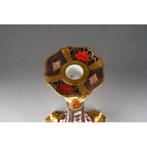 21 - A Royal Crown Derby Imari 1128 candlestick, 2nd quality, red backstamps, approx 26cm high [1] no app... 