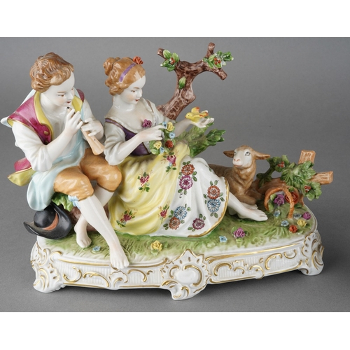 29 - A 20th century German Unterweissbach porcelain figure group of shepherd, shepherdess and sheep, prin... 