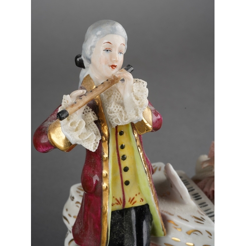29 - A 20th century German Unterweissbach porcelain figure group of shepherd, shepherdess and sheep, prin... 