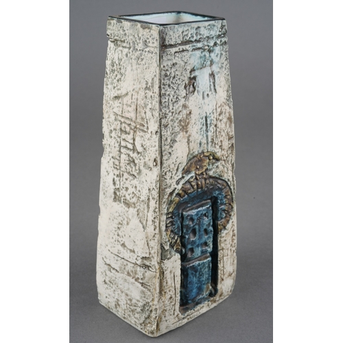 36 - A Troika coffin vase by Anne Bennet, circa 173/9, with incised absract figure and building over oatm... 