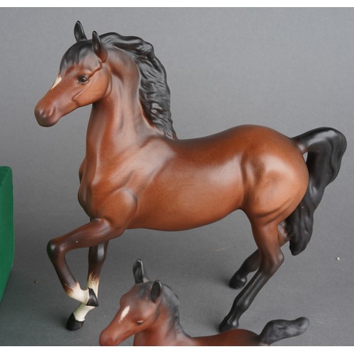 45 - A collection of Beswick horses to include: grey foal #916 impressed marks, five various Bay foals, p... 