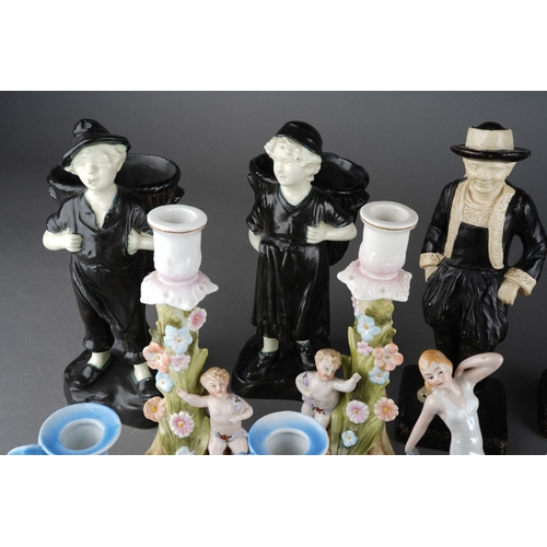 59 - A box of early / first half 20th century figural ceramics, including a pair of bronzed finish spill ... 
