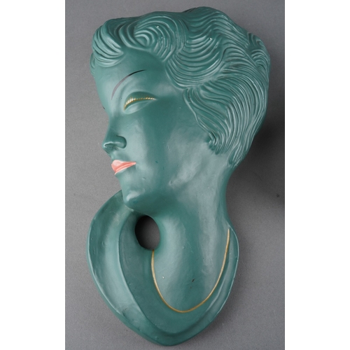 61 - A German Cortendorf wall plaque of a female in side profile with pony tail, impressed no.3408, print... 