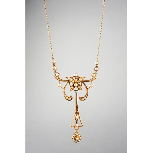 An Edwardian 15ct gold seed pearl necklace, with antique case. Stamped 15ct, approx length 465mm, approx weight 6.79grams.