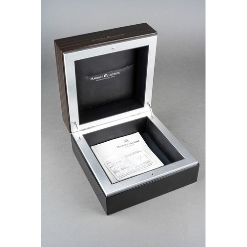 11 - A Maurice Lacroix box for a watch, lackins watch, internal cushions, comes with two warranty booklet... 