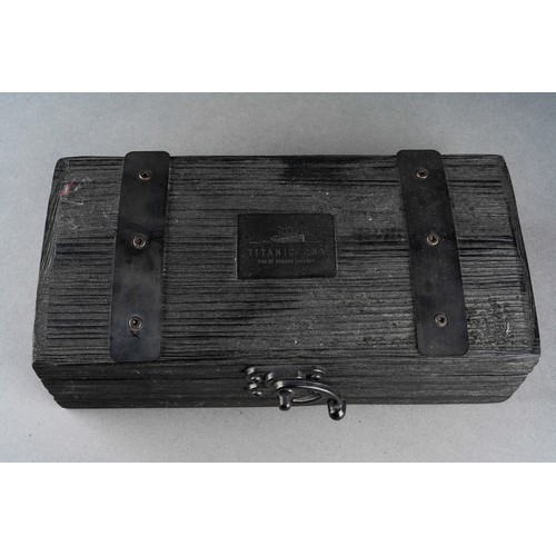 12 - A Romain Jerome / B & J P Lepine Titanic DNA plastic pen case in the form of a  metal bound cabin tr... 