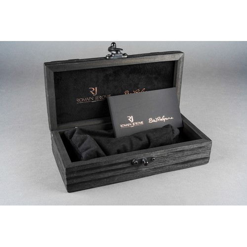 12 - A Romain Jerome / B & J P Lepine Titanic DNA plastic pen case in the form of a  metal bound cabin tr... 