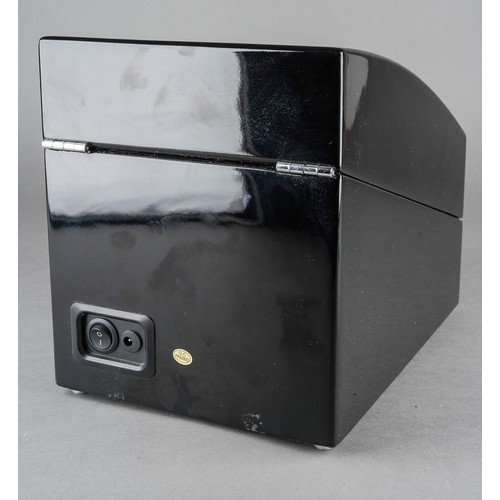 15 - A black finish automatic watch winding case for two watches, the glazed hinged sloped front enclosin... 