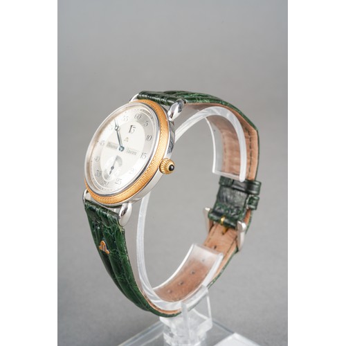 21 - A Maurice Lacroix 'Jumping Hour' yellow metal and stainless steel manual winding wristwatch. The dia... 