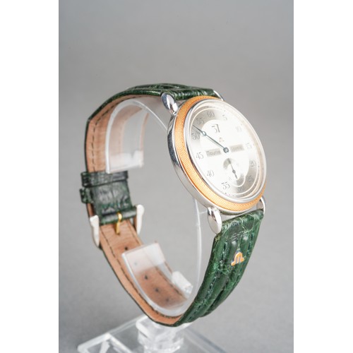 21 - A Maurice Lacroix 'Jumping Hour' yellow metal and stainless steel manual winding wristwatch. The dia... 