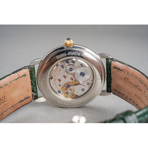 21 - A Maurice Lacroix 'Jumping Hour' yellow metal and stainless steel manual winding wristwatch. The dia... 