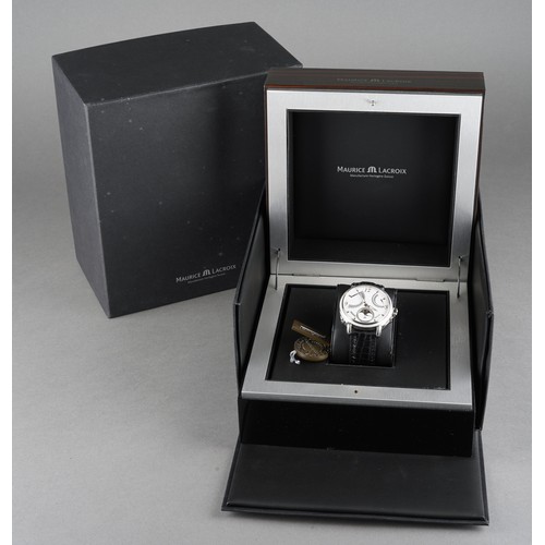 25 - A Maurice Lacroix Masterpiece 'Lune Retrograde' stainless steel manual wind wristwatch. The silver d... 