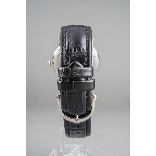 32 - A boxed Maurice Lacroix gents stainless steel automatic wrist watch on a branded black leather strap... 