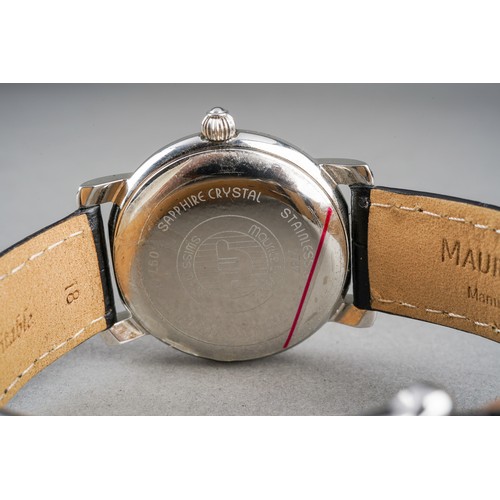 32 - A boxed Maurice Lacroix gents stainless steel automatic wrist watch on a branded black leather strap... 