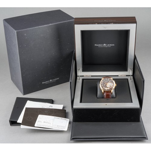 34 - A boxed Maurice Lacroix 18ct yellow gold Pontos decentrique GMT wrist watch, on a branded brown leat... 