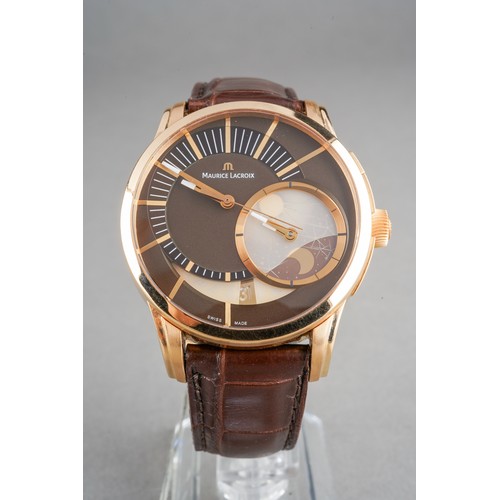 34 - A boxed Maurice Lacroix 18ct yellow gold Pontos decentrique GMT wrist watch, on a branded brown leat... 
