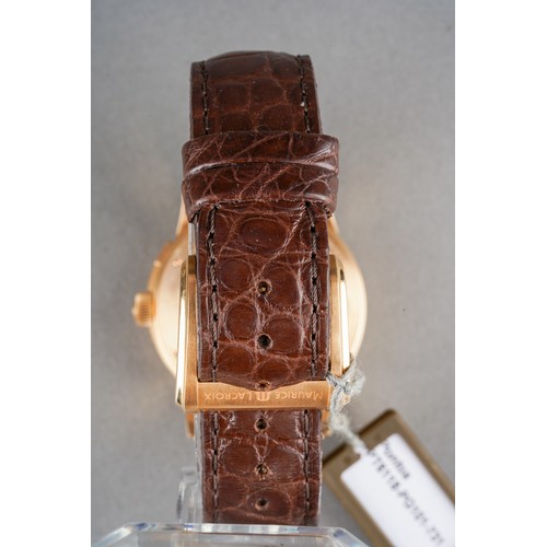 34 - A boxed Maurice Lacroix 18ct yellow gold Pontos decentrique GMT wrist watch, on a branded brown leat... 