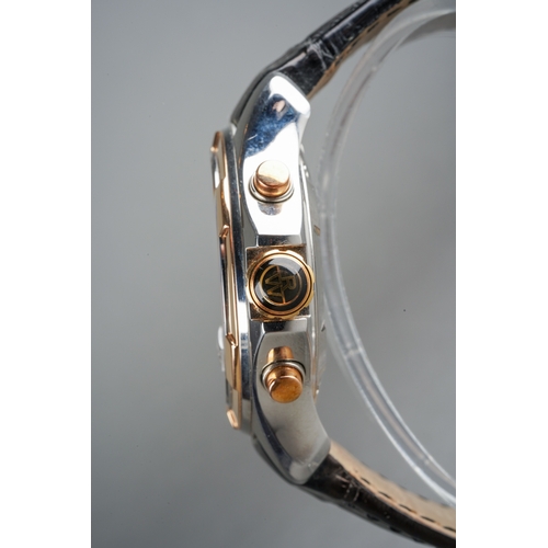 42 - A boxed Raymond Weil Parsifal Chronograph stainless steel and gold plated gent's wrist watch, black ... 