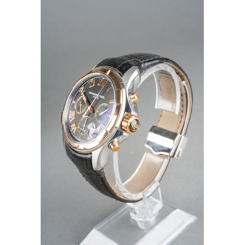 42 - A boxed Raymond Weil Parsifal Chronograph stainless steel and gold plated gent's wrist watch, black ... 