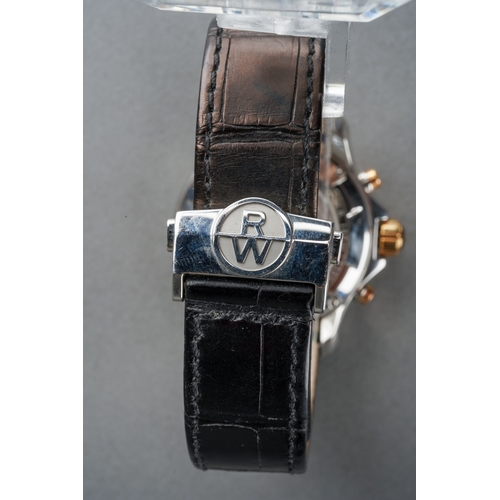 42 - A boxed Raymond Weil Parsifal Chronograph stainless steel and gold plated gent's wrist watch, black ... 
