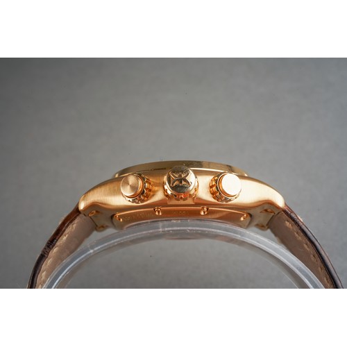 51 - An Ebel '1911' 18ct yellow gold automatic chronograph wristwatch.  The circular-shaped dial with lum... 