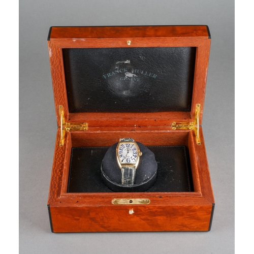 52 - A Frank Muller 'Curvex Sunset' limited edition 18ct yellow gold automatic wristwatch. The dial with ... 
