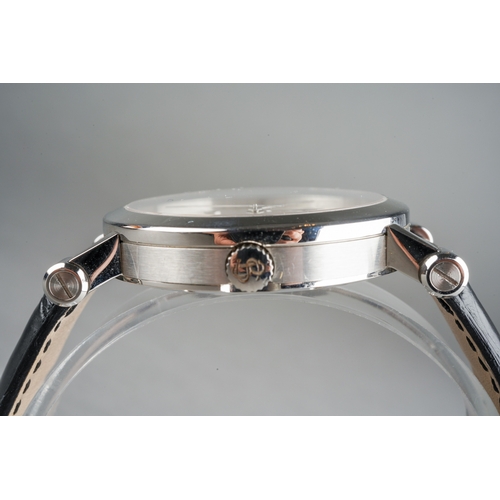 57 - A BULGARI 'Sotirio' stainless steel automatic wristwatch. The dial with silver tone hourly applied m... 