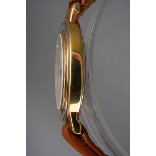 5 - A Bugatti wristwatch. The white dial with black Arabic numerals, case diameter approx 28mm, assessed... 