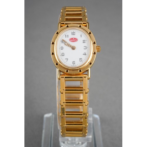 6 - A Bugatti wristwatch. The white dial with black Arabic numerals, oval shaped case, measuring approx ... 