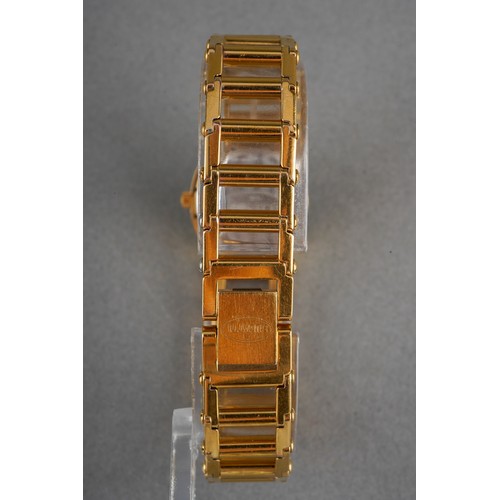 6 - A Bugatti wristwatch. The white dial with black Arabic numerals, oval shaped case, measuring approx ... 